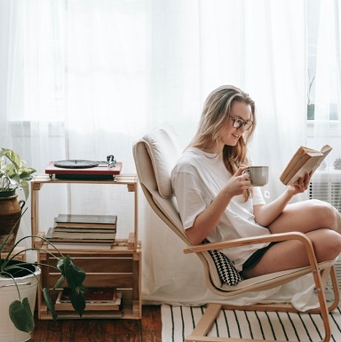 woman relaxing listening to music